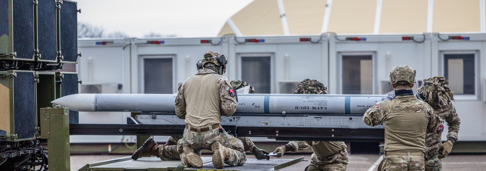 Air Defence Wing crew genlader NASAMS launcher.